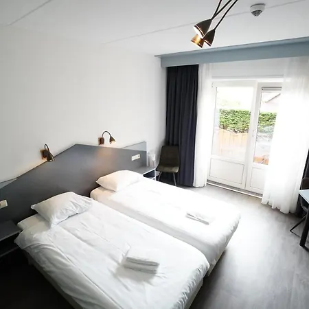 Hotel Den Burg 호텔