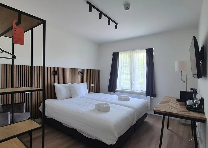 Hotel Den Burg 호텔